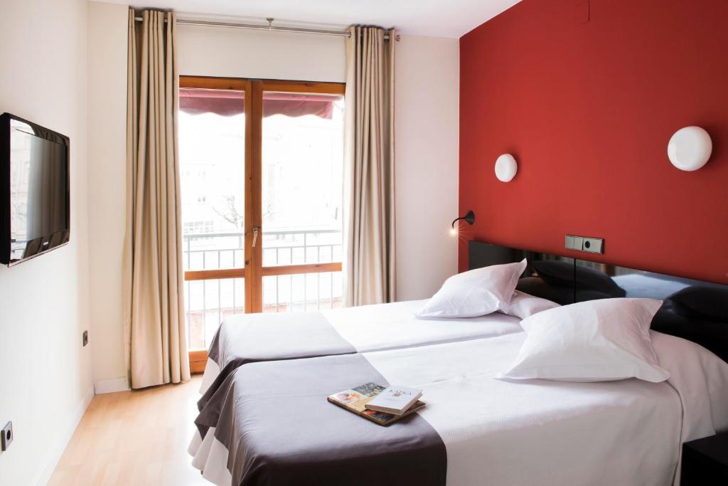 Hospedium Hostal Un Punto Chic Huesca Zimmer foto